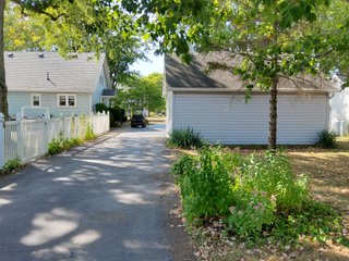 Beautiful country home. 2,692+/- finished sq. ft. home or a total of  3,588+/- sq. ft., 2 pole buildings 40'x75' & 50'x50' w/ interconnecting corridor, both heated & insulated. One has been used as a shop/storage/commercially & has water & rest room. The other has multi-uses w/ tile flooring, full bath & kitchenette great for get-togethers, auto storage & many other uses & a 32'x40' pole building w/ gravel floor great for horses & livestock or extra storage, an additional separate 2 car garage. The home has had many updates most noticeably a totally remodeled master suite, flooring throughout the home, a second main floor bedroom w/ walkout deck & patio, there is a 3rd bedroom, upstairs & large landing w/ room for an extra bed. One & a half baths, large living room, sliding door to deck & patio. Eat in kitchen w/ appliances, a separate dining area. Central air & heat pump. Shady rear patio & deck. The basement is partially finished. There are many updates & amenities too numerous to mention & must be seen in person. A great property for storage, business, hobbies and/or livestock. Stocked fish pond, pasture & potential building site. Come & investigate the potential. - REAL ESTATE FOR SALE - 10.2+/- ACRES IN WHITLEY COUNTY INDIANA