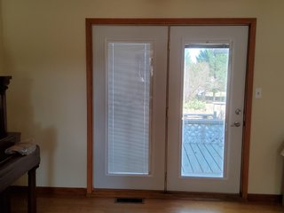 Beautiful country home. 2,692+/- finished sq. ft. home or a total of  3,588+/- sq. ft., 2 pole buildings 40'x75' & 50'x50' w/ interconnecting corridor, both heated & insulated. One has been used as a shop/storage/commercially & has water & rest room. The other has multi-uses w/ tile flooring, full bath & kitchenette great for get-togethers, auto storage & many other uses & a 32'x40' pole building w/ gravel floor great for horses & livestock or extra storage, an additional separate 2 car garage. The home has had many updates most noticeably a totally remodeled master suite, flooring throughout the home, a second main floor bedroom w/ walkout deck & patio, there is a 3rd bedroom, upstairs & large landing w/ room for an extra bed. One & a half baths, large living room, sliding door to deck & patio. Eat in kitchen w/ appliances, a separate dining area. Central air & heat pump. Shady rear patio & deck. The basement is partially finished. There are many updates & amenities too numerous to mention & must be seen in person. A great property for storage, business, hobbies and/or livestock. Stocked fish pond, pasture & potential building site. Come & investigate the potential. - REAL ESTATE FOR SALE - 10.2+/- ACRES IN WHITLEY COUNTY INDIANA