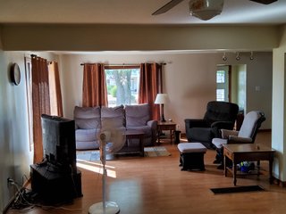 Beautiful country home. 2,692+/- finished sq. ft. home or a total of  3,588+/- sq. ft., 2 pole buildings 40'x75' & 50'x50' w/ interconnecting corridor, both heated & insulated. One has been used as a shop/storage/commercially & has water & rest room. The other has multi-uses w/ tile flooring, full bath & kitchenette great for get-togethers, auto storage & many other uses & a 32'x40' pole building w/ gravel floor great for horses & livestock or extra storage, an additional separate 2 car garage. The home has had many updates most noticeably a totally remodeled master suite, flooring throughout the home, a second main floor bedroom w/ walkout deck & patio, there is a 3rd bedroom, upstairs & large landing w/ room for an extra bed. One & a half baths, large living room, sliding door to deck & patio. Eat in kitchen w/ appliances, a separate dining area. Central air & heat pump. Shady rear patio & deck. The basement is partially finished. There are many updates & amenities too numerous to mention & must be seen in person. A great property for storage, business, hobbies and/or livestock. Stocked fish pond, pasture & potential building site. Come & investigate the potential. - REAL ESTATE FOR SALE - 10.2+/- ACRES IN WHITLEY COUNTY INDIANA