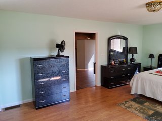 Beautiful country home. 2,692+/- finished sq. ft. home or a total of  3,588+/- sq. ft., 2 pole buildings 40'x75' & 50'x50' w/ interconnecting corridor, both heated & insulated. One has been used as a shop/storage/commercially & has water & rest room. The other has multi-uses w/ tile flooring, full bath & kitchenette great for get-togethers, auto storage & many other uses & a 32'x40' pole building w/ gravel floor great for horses & livestock or extra storage, an additional separate 2 car garage. The home has had many updates most noticeably a totally remodeled master suite, flooring throughout the home, a second main floor bedroom w/ walkout deck & patio, there is a 3rd bedroom, upstairs & large landing w/ room for an extra bed. One & a half baths, large living room, sliding door to deck & patio. Eat in kitchen w/ appliances, a separate dining area. Central air & heat pump. Shady rear patio & deck. The basement is partially finished. There are many updates & amenities too numerous to mention & must be seen in person. A great property for storage, business, hobbies and/or livestock. Stocked fish pond, pasture & potential building site. Come & investigate the potential. - REAL ESTATE FOR SALE - 10.2+/- ACRES IN WHITLEY COUNTY INDIANA