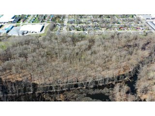 Consider the potential of this 18.77+/- acre woods within Warsaw city limits. Hunting available with permit. Potential timber value. Close to Little League baseball diamonds. - 18.77+/- Acres for Sale in Kosciusko County, Indiana