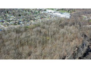 Consider the potential of this 18.77+/- acre woods within Warsaw city limits. Hunting available with permit. Potential timber value. Close to Little League baseball diamonds. - 18.77+/- Acres for Sale in Kosciusko County, Indiana