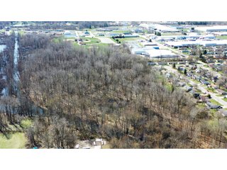 Consider the potential of this 18.77+/- acre woods within Warsaw city limits. Hunting available with permit. Potential timber value. Close to Little League baseball diamonds. - 18.77+/- Acres for Sale in Kosciusko County, Indiana
