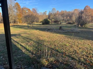 This 153+/- acre piece located in Mammoth Cave, KY sits in Edmonson County and borders the famous Mammoth Cave National Park. Any avid outdoorsman will quickly grow to admire this rural masterpiece and the natural beauty it provides. The property features numerous ponds, abundant wooded area suitable for hunting, and more. The primary dwelling measures 1,840 square feet and consists of three bedrooms, two bathrooms, and an unfinished basement. The dwelling also contains a 640 square foot two car attached garage. Additionally, a small hunting type cabin is present on the property as well as a utility barn for storage or other purposes. Furthermore, the property is within close proximity to a wide variety of attractions, such as Mammoth Cave, Nolin Lake, Blue Holler Off-Road Park, Mammoth Cave Horse Camp and much more. A wonderful opportunity for anyone looking for their ideal outdoor escape! - A Beautiful Setting in the Hills of South Central Kentucky!!