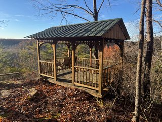 This 153+/- acre piece located in Mammoth Cave, KY sits in Edmonson County and borders the famous Mammoth Cave National Park. Any avid outdoorsman will quickly grow to admire this rural masterpiece and the natural beauty it provides. The property features numerous ponds, abundant wooded area suitable for hunting, and more. The primary dwelling measures 1,840 square feet and consists of three bedrooms, two bathrooms, and an unfinished basement. The dwelling also contains a 640 square foot two car attached garage. Additionally, a small hunting type cabin is present on the property as well as a utility barn for storage or other purposes. Furthermore, the property is within close proximity to a wide variety of attractions, such as Mammoth Cave, Nolin Lake, Blue Holler Off-Road Park, Mammoth Cave Horse Camp and much more. A wonderful opportunity for anyone looking for their ideal outdoor escape! - A Beautiful Setting in the Hills of South Central Kentucky!!