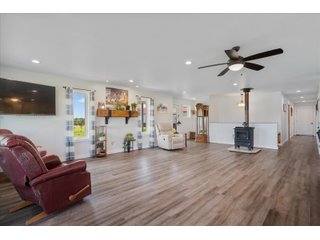 <B><font color=red>STILL ACCEPTING OFFERS</FONT></B>


Schrader Real Estate & Auction Co is pleased to present this unique real estate opportunity comprised of a beautiful custom-built home, scenic pond, large machine shed and barn, all sitting on 34+/- acres. Enjoy your morning coffee from the spacious kitchen or covered deck while seeing wildlife in the fields and pond. This setting offers both the enjoyment of relaxing by yourself or hosting large gatherings with friends and family in the finished basement or large outdoor patio with over 1,000 sq ft of outdoor finished space. Get ready to enjoy all the benefits of being in the country with both the machine shed that has a heated office or in the barn set up for your choice of any type of livestock. With the barn having concrete floor and fully insulated, this can easily be converted to a shop or storage. <br>
<li>	Built in 2021
<li>	Oversized 3-Car Garage
<li>	Custom made Cabinets and Vanities
<li>	Stainless steel appliances
<li>	Gas and Electric hookup for Stove and Dryer
<li>	Gas hookup for Living Room Fireplace
<li>	Sky lights in Master and Main bathroom
<li>	Finished Heated garage with floor drain and heavy duty wiring and receptacles 
<li>	Freestanding wood/coal Stove in living room (No electric needed)
<li>	Covered front porch, covered deck, and outdoor patio (partially covered)
<li>	Fruit/Root Cellar with Ample Shelving
<li>	Dual zone Upstairs/Downstairs energy efficient LP furnace
<li>	Whole house generator Hookup with Interlock System
<li>	R-24 sidewall/R-60 Ceiling dense pack insulation in House & Garage
<li>	Basement Spray Foamed (Walls and Box Sills)
<li>	All open windows are casement
<li>	Beautiful knotty pine ceilings on both Covered Deck and Porch
<li>	Maintenance-Free siding and decking
<li>	Cement Front porch and sidewalk to patio
<li>	Hookups for big screen in living room, Master bedroom, and Basement
<li>	120 ft drilled well 15 GPM that serves house, barn, shed, and garden
<li>	All underground wiring
<li>	Frost-free hydrant next to fertile mound garden
<li>	Small apple and pear orchard 
<li>	Landscape included trees and perennials for low maintenance 
<li>	Over 300 trees and shrubs in spacious yard 
<li>	Over 150 trees and shrubs under dripline
<li>	Approximately 0.75-acre pond 16 feet deep on far end with rock spillway
<li>	Entire driveway covered with blue rock
<li>	Frostless faucets on three sides of house
<li>	Outside receptacles on all four sides of house (eight total)
<li>	Small porch off laundry room with maintenance free decking
<li>	Battery backup sump pump that very rarely turns on
<li>	All high tensile woven wire fencing with six separated pasture and paddocks - REAL ESTATE FOR SALE 34+/- ACRES IN MARATHON COUNTY, WISCONSIN