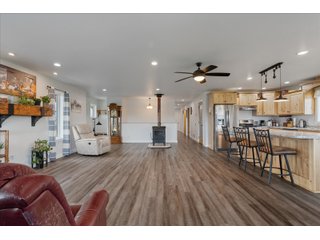 <B><font color=red>STILL ACCEPTING OFFERS</FONT></B>


Schrader Real Estate & Auction Co is pleased to present this unique real estate opportunity comprised of a beautiful custom-built home, scenic pond, large machine shed and barn, all sitting on 34+/- acres. Enjoy your morning coffee from the spacious kitchen or covered deck while seeing wildlife in the fields and pond. This setting offers both the enjoyment of relaxing by yourself or hosting large gatherings with friends and family in the finished basement or large outdoor patio with over 1,000 sq ft of outdoor finished space. Get ready to enjoy all the benefits of being in the country with both the machine shed that has a heated office or in the barn set up for your choice of any type of livestock. With the barn having concrete floor and fully insulated, this can easily be converted to a shop or storage. <br>
<li>	Built in 2021
<li>	Oversized 3-Car Garage
<li>	Custom made Cabinets and Vanities
<li>	Stainless steel appliances
<li>	Gas and Electric hookup for Stove and Dryer
<li>	Gas hookup for Living Room Fireplace
<li>	Sky lights in Master and Main bathroom
<li>	Finished Heated garage with floor drain and heavy duty wiring and receptacles 
<li>	Freestanding wood/coal Stove in living room (No electric needed)
<li>	Covered front porch, covered deck, and outdoor patio (partially covered)
<li>	Fruit/Root Cellar with Ample Shelving
<li>	Dual zone Upstairs/Downstairs energy efficient LP furnace
<li>	Whole house generator Hookup with Interlock System
<li>	R-24 sidewall/R-60 Ceiling dense pack insulation in House & Garage
<li>	Basement Spray Foamed (Walls and Box Sills)
<li>	All open windows are casement
<li>	Beautiful knotty pine ceilings on both Covered Deck and Porch
<li>	Maintenance-Free siding and decking
<li>	Cement Front porch and sidewalk to patio
<li>	Hookups for big screen in living room, Master bedroom, and Basement
<li>	120 ft drilled well 15 GPM that serves house, barn, shed, and garden
<li>	All underground wiring
<li>	Frost-free hydrant next to fertile mound garden
<li>	Small apple and pear orchard 
<li>	Landscape included trees and perennials for low maintenance 
<li>	Over 300 trees and shrubs in spacious yard 
<li>	Over 150 trees and shrubs under dripline
<li>	Approximately 0.75-acre pond 16 feet deep on far end with rock spillway
<li>	Entire driveway covered with blue rock
<li>	Frostless faucets on three sides of house
<li>	Outside receptacles on all four sides of house (eight total)
<li>	Small porch off laundry room with maintenance free decking
<li>	Battery backup sump pump that very rarely turns on
<li>	All high tensile woven wire fencing with six separated pasture and paddocks - REAL ESTATE FOR SALE 34+/- ACRES IN MARATHON COUNTY, WISCONSIN
