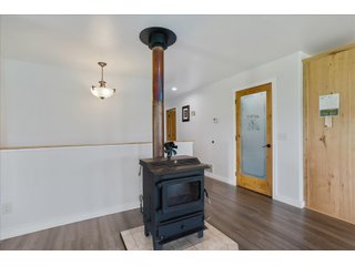 <B><font color=red>STILL ACCEPTING OFFERS</FONT></B>


Schrader Real Estate & Auction Co is pleased to present this unique real estate opportunity comprised of a beautiful custom-built home, scenic pond, large machine shed and barn, all sitting on 34+/- acres. Enjoy your morning coffee from the spacious kitchen or covered deck while seeing wildlife in the fields and pond. This setting offers both the enjoyment of relaxing by yourself or hosting large gatherings with friends and family in the finished basement or large outdoor patio with over 1,000 sq ft of outdoor finished space. Get ready to enjoy all the benefits of being in the country with both the machine shed that has a heated office or in the barn set up for your choice of any type of livestock. With the barn having concrete floor and fully insulated, this can easily be converted to a shop or storage. <br>
<li>	Built in 2021
<li>	Oversized 3-Car Garage
<li>	Custom made Cabinets and Vanities
<li>	Stainless steel appliances
<li>	Gas and Electric hookup for Stove and Dryer
<li>	Gas hookup for Living Room Fireplace
<li>	Sky lights in Master and Main bathroom
<li>	Finished Heated garage with floor drain and heavy duty wiring and receptacles 
<li>	Freestanding wood/coal Stove in living room (No electric needed)
<li>	Covered front porch, covered deck, and outdoor patio (partially covered)
<li>	Fruit/Root Cellar with Ample Shelving
<li>	Dual zone Upstairs/Downstairs energy efficient LP furnace
<li>	Whole house generator Hookup with Interlock System
<li>	R-24 sidewall/R-60 Ceiling dense pack insulation in House & Garage
<li>	Basement Spray Foamed (Walls and Box Sills)
<li>	All open windows are casement
<li>	Beautiful knotty pine ceilings on both Covered Deck and Porch
<li>	Maintenance-Free siding and decking
<li>	Cement Front porch and sidewalk to patio
<li>	Hookups for big screen in living room, Master bedroom, and Basement
<li>	120 ft drilled well 15 GPM that serves house, barn, shed, and garden
<li>	All underground wiring
<li>	Frost-free hydrant next to fertile mound garden
<li>	Small apple and pear orchard 
<li>	Landscape included trees and perennials for low maintenance 
<li>	Over 300 trees and shrubs in spacious yard 
<li>	Over 150 trees and shrubs under dripline
<li>	Approximately 0.75-acre pond 16 feet deep on far end with rock spillway
<li>	Entire driveway covered with blue rock
<li>	Frostless faucets on three sides of house
<li>	Outside receptacles on all four sides of house (eight total)
<li>	Small porch off laundry room with maintenance free decking
<li>	Battery backup sump pump that very rarely turns on
<li>	All high tensile woven wire fencing with six separated pasture and paddocks - REAL ESTATE FOR SALE 34+/- ACRES IN MARATHON COUNTY, WISCONSIN