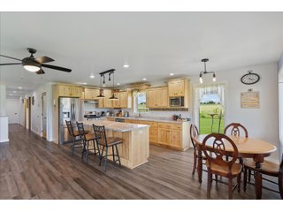 <B><font color=red>STILL ACCEPTING OFFERS</FONT></B>


Schrader Real Estate & Auction Co is pleased to present this unique real estate opportunity comprised of a beautiful custom-built home, scenic pond, large machine shed and barn, all sitting on 34+/- acres. Enjoy your morning coffee from the spacious kitchen or covered deck while seeing wildlife in the fields and pond. This setting offers both the enjoyment of relaxing by yourself or hosting large gatherings with friends and family in the finished basement or large outdoor patio with over 1,000 sq ft of outdoor finished space. Get ready to enjoy all the benefits of being in the country with both the machine shed that has a heated office or in the barn set up for your choice of any type of livestock. With the barn having concrete floor and fully insulated, this can easily be converted to a shop or storage. <br>
<li>	Built in 2021
<li>	Oversized 3-Car Garage
<li>	Custom made Cabinets and Vanities
<li>	Stainless steel appliances
<li>	Gas and Electric hookup for Stove and Dryer
<li>	Gas hookup for Living Room Fireplace
<li>	Sky lights in Master and Main bathroom
<li>	Finished Heated garage with floor drain and heavy duty wiring and receptacles 
<li>	Freestanding wood/coal Stove in living room (No electric needed)
<li>	Covered front porch, covered deck, and outdoor patio (partially covered)
<li>	Fruit/Root Cellar with Ample Shelving
<li>	Dual zone Upstairs/Downstairs energy efficient LP furnace
<li>	Whole house generator Hookup with Interlock System
<li>	R-24 sidewall/R-60 Ceiling dense pack insulation in House & Garage
<li>	Basement Spray Foamed (Walls and Box Sills)
<li>	All open windows are casement
<li>	Beautiful knotty pine ceilings on both Covered Deck and Porch
<li>	Maintenance-Free siding and decking
<li>	Cement Front porch and sidewalk to patio
<li>	Hookups for big screen in living room, Master bedroom, and Basement
<li>	120 ft drilled well 15 GPM that serves house, barn, shed, and garden
<li>	All underground wiring
<li>	Frost-free hydrant next to fertile mound garden
<li>	Small apple and pear orchard 
<li>	Landscape included trees and perennials for low maintenance 
<li>	Over 300 trees and shrubs in spacious yard 
<li>	Over 150 trees and shrubs under dripline
<li>	Approximately 0.75-acre pond 16 feet deep on far end with rock spillway
<li>	Entire driveway covered with blue rock
<li>	Frostless faucets on three sides of house
<li>	Outside receptacles on all four sides of house (eight total)
<li>	Small porch off laundry room with maintenance free decking
<li>	Battery backup sump pump that very rarely turns on
<li>	All high tensile woven wire fencing with six separated pasture and paddocks - REAL ESTATE FOR SALE 34+/- ACRES IN MARATHON COUNTY, WISCONSIN