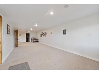 <B><font color=red>STILL ACCEPTING OFFERS</FONT></B>


Schrader Real Estate & Auction Co is pleased to present this unique real estate opportunity comprised of a beautiful custom-built home, scenic pond, large machine shed and barn, all sitting on 34+/- acres. Enjoy your morning coffee from the spacious kitchen or covered deck while seeing wildlife in the fields and pond. This setting offers both the enjoyment of relaxing by yourself or hosting large gatherings with friends and family in the finished basement or large outdoor patio with over 1,000 sq ft of outdoor finished space. Get ready to enjoy all the benefits of being in the country with both the machine shed that has a heated office or in the barn set up for your choice of any type of livestock. With the barn having concrete floor and fully insulated, this can easily be converted to a shop or storage. <br>
<li>	Built in 2021
<li>	Oversized 3-Car Garage
<li>	Custom made Cabinets and Vanities
<li>	Stainless steel appliances
<li>	Gas and Electric hookup for Stove and Dryer
<li>	Gas hookup for Living Room Fireplace
<li>	Sky lights in Master and Main bathroom
<li>	Finished Heated garage with floor drain and heavy duty wiring and receptacles 
<li>	Freestanding wood/coal Stove in living room (No electric needed)
<li>	Covered front porch, covered deck, and outdoor patio (partially covered)
<li>	Fruit/Root Cellar with Ample Shelving
<li>	Dual zone Upstairs/Downstairs energy efficient LP furnace
<li>	Whole house generator Hookup with Interlock System
<li>	R-24 sidewall/R-60 Ceiling dense pack insulation in House & Garage
<li>	Basement Spray Foamed (Walls and Box Sills)
<li>	All open windows are casement
<li>	Beautiful knotty pine ceilings on both Covered Deck and Porch
<li>	Maintenance-Free siding and decking
<li>	Cement Front porch and sidewalk to patio
<li>	Hookups for big screen in living room, Master bedroom, and Basement
<li>	120 ft drilled well 15 GPM that serves house, barn, shed, and garden
<li>	All underground wiring
<li>	Frost-free hydrant next to fertile mound garden
<li>	Small apple and pear orchard 
<li>	Landscape included trees and perennials for low maintenance 
<li>	Over 300 trees and shrubs in spacious yard 
<li>	Over 150 trees and shrubs under dripline
<li>	Approximately 0.75-acre pond 16 feet deep on far end with rock spillway
<li>	Entire driveway covered with blue rock
<li>	Frostless faucets on three sides of house
<li>	Outside receptacles on all four sides of house (eight total)
<li>	Small porch off laundry room with maintenance free decking
<li>	Battery backup sump pump that very rarely turns on
<li>	All high tensile woven wire fencing with six separated pasture and paddocks - REAL ESTATE FOR SALE 34+/- ACRES IN MARATHON COUNTY, WISCONSIN