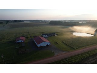 <B><font color=red>STILL ACCEPTING OFFERS</FONT></B>


Schrader Real Estate & Auction Co is pleased to present this unique real estate opportunity comprised of a beautiful custom-built home, scenic pond, large machine shed and barn, all sitting on 34+/- acres. Enjoy your morning coffee from the spacious kitchen or covered deck while seeing wildlife in the fields and pond. This setting offers both the enjoyment of relaxing by yourself or hosting large gatherings with friends and family in the finished basement or large outdoor patio with over 1,000 sq ft of outdoor finished space. Get ready to enjoy all the benefits of being in the country with both the machine shed that has a heated office or in the barn set up for your choice of any type of livestock. With the barn having concrete floor and fully insulated, this can easily be converted to a shop or storage. <br>
<li>	Built in 2021
<li>	Oversized 3-Car Garage
<li>	Custom made Cabinets and Vanities
<li>	Stainless steel appliances
<li>	Gas and Electric hookup for Stove and Dryer
<li>	Gas hookup for Living Room Fireplace
<li>	Sky lights in Master and Main bathroom
<li>	Finished Heated garage with floor drain and heavy duty wiring and receptacles 
<li>	Freestanding wood/coal Stove in living room (No electric needed)
<li>	Covered front porch, covered deck, and outdoor patio (partially covered)
<li>	Fruit/Root Cellar with Ample Shelving
<li>	Dual zone Upstairs/Downstairs energy efficient LP furnace
<li>	Whole house generator Hookup with Interlock System
<li>	R-24 sidewall/R-60 Ceiling dense pack insulation in House & Garage
<li>	Basement Spray Foamed (Walls and Box Sills)
<li>	All open windows are casement
<li>	Beautiful knotty pine ceilings on both Covered Deck and Porch
<li>	Maintenance-Free siding and decking
<li>	Cement Front porch and sidewalk to patio
<li>	Hookups for big screen in living room, Master bedroom, and Basement
<li>	120 ft drilled well 15 GPM that serves house, barn, shed, and garden
<li>	All underground wiring
<li>	Frost-free hydrant next to fertile mound garden
<li>	Small apple and pear orchard 
<li>	Landscape included trees and perennials for low maintenance 
<li>	Over 300 trees and shrubs in spacious yard 
<li>	Over 150 trees and shrubs under dripline
<li>	Approximately 0.75-acre pond 16 feet deep on far end with rock spillway
<li>	Entire driveway covered with blue rock
<li>	Frostless faucets on three sides of house
<li>	Outside receptacles on all four sides of house (eight total)
<li>	Small porch off laundry room with maintenance free decking
<li>	Battery backup sump pump that very rarely turns on
<li>	All high tensile woven wire fencing with six separated pasture and paddocks - REAL ESTATE FOR SALE 34+/- ACRES IN MARATHON COUNTY, WISCONSIN
