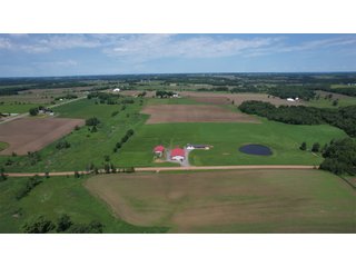 <B><font color=red>STILL ACCEPTING OFFERS</FONT></B>


Schrader Real Estate & Auction Co is pleased to present this unique real estate opportunity comprised of a beautiful custom-built home, scenic pond, large machine shed and barn, all sitting on 34+/- acres. Enjoy your morning coffee from the spacious kitchen or covered deck while seeing wildlife in the fields and pond. This setting offers both the enjoyment of relaxing by yourself or hosting large gatherings with friends and family in the finished basement or large outdoor patio with over 1,000 sq ft of outdoor finished space. Get ready to enjoy all the benefits of being in the country with both the machine shed that has a heated office or in the barn set up for your choice of any type of livestock. With the barn having concrete floor and fully insulated, this can easily be converted to a shop or storage. <br>
<li>	Built in 2021
<li>	Oversized 3-Car Garage
<li>	Custom made Cabinets and Vanities
<li>	Stainless steel appliances
<li>	Gas and Electric hookup for Stove and Dryer
<li>	Gas hookup for Living Room Fireplace
<li>	Sky lights in Master and Main bathroom
<li>	Finished Heated garage with floor drain and heavy duty wiring and receptacles 
<li>	Freestanding wood/coal Stove in living room (No electric needed)
<li>	Covered front porch, covered deck, and outdoor patio (partially covered)
<li>	Fruit/Root Cellar with Ample Shelving
<li>	Dual zone Upstairs/Downstairs energy efficient LP furnace
<li>	Whole house generator Hookup with Interlock System
<li>	R-24 sidewall/R-60 Ceiling dense pack insulation in House & Garage
<li>	Basement Spray Foamed (Walls and Box Sills)
<li>	All open windows are casement
<li>	Beautiful knotty pine ceilings on both Covered Deck and Porch
<li>	Maintenance-Free siding and decking
<li>	Cement Front porch and sidewalk to patio
<li>	Hookups for big screen in living room, Master bedroom, and Basement
<li>	120 ft drilled well 15 GPM that serves house, barn, shed, and garden
<li>	All underground wiring
<li>	Frost-free hydrant next to fertile mound garden
<li>	Small apple and pear orchard 
<li>	Landscape included trees and perennials for low maintenance 
<li>	Over 300 trees and shrubs in spacious yard 
<li>	Over 150 trees and shrubs under dripline
<li>	Approximately 0.75-acre pond 16 feet deep on far end with rock spillway
<li>	Entire driveway covered with blue rock
<li>	Frostless faucets on three sides of house
<li>	Outside receptacles on all four sides of house (eight total)
<li>	Small porch off laundry room with maintenance free decking
<li>	Battery backup sump pump that very rarely turns on
<li>	All high tensile woven wire fencing with six separated pasture and paddocks - REAL ESTATE FOR SALE 34+/- ACRES IN MARATHON COUNTY, WISCONSIN