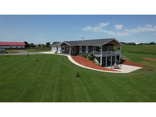 <B><font color=red>STILL ACCEPTING OFFERS</FONT></B>


Schrader Real Estate & Auction Co is pleased to present this unique real estate opportunity comprised of a beautiful custom-built home, scenic pond, large machine shed and barn, all sitting on 34+/- acres. Enjoy your morning coffee from the spacious kitchen or covered deck while seeing wildlife in the fields and pond. This setting offers both the enjoyment of relaxing by yourself or hosting large gatherings with friends and family in the finished basement or large outdoor patio with over 1,000 sq ft of outdoor finished space. Get ready to enjoy all the benefits of being in the country with both the machine shed that has a heated office or in the barn set up for your choice of any type of livestock. With the barn having concrete floor and fully insulated, this can easily be converted to a shop or storage. <br>
<li>	Built in 2021
<li>	Oversized 3-Car Garage
<li>	Custom made Cabinets and Vanities
<li>	Stainless steel appliances
<li>	Gas and Electric hookup for Stove and Dryer
<li>	Gas hookup for Living Room Fireplace
<li>	Sky lights in Master and Main bathroom
<li>	Finished Heated garage with floor drain and heavy duty wiring and receptacles 
<li>	Freestanding wood/coal Stove in living room (No electric needed)
<li>	Covered front porch, covered deck, and outdoor patio (partially covered)
<li>	Fruit/Root Cellar with Ample Shelving
<li>	Dual zone Upstairs/Downstairs energy efficient LP furnace
<li>	Whole house generator Hookup with Interlock System
<li>	R-24 sidewall/R-60 Ceiling dense pack insulation in House & Garage
<li>	Basement Spray Foamed (Walls and Box Sills)
<li>	All open windows are casement
<li>	Beautiful knotty pine ceilings on both Covered Deck and Porch
<li>	Maintenance-Free siding and decking
<li>	Cement Front porch and sidewalk to patio
<li>	Hookups for big screen in living room, Master bedroom, and Basement
<li>	120 ft drilled well 15 GPM that serves house, barn, shed, and garden
<li>	All underground wiring
<li>	Frost-free hydrant next to fertile mound garden
<li>	Small apple and pear orchard 
<li>	Landscape included trees and perennials for low maintenance 
<li>	Over 300 trees and shrubs in spacious yard 
<li>	Over 150 trees and shrubs under dripline
<li>	Approximately 0.75-acre pond 16 feet deep on far end with rock spillway
<li>	Entire driveway covered with blue rock
<li>	Frostless faucets on three sides of house
<li>	Outside receptacles on all four sides of house (eight total)
<li>	Small porch off laundry room with maintenance free decking
<li>	Battery backup sump pump that very rarely turns on
<li>	All high tensile woven wire fencing with six separated pasture and paddocks - REAL ESTATE FOR SALE 34+/- ACRES IN MARATHON COUNTY, WISCONSIN