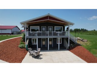 <B><font color=red>STILL ACCEPTING OFFERS</FONT></B>


Schrader Real Estate & Auction Co is pleased to present this unique real estate opportunity comprised of a beautiful custom-built home, scenic pond, large machine shed and barn, all sitting on 34+/- acres. Enjoy your morning coffee from the spacious kitchen or covered deck while seeing wildlife in the fields and pond. This setting offers both the enjoyment of relaxing by yourself or hosting large gatherings with friends and family in the finished basement or large outdoor patio with over 1,000 sq ft of outdoor finished space. Get ready to enjoy all the benefits of being in the country with both the machine shed that has a heated office or in the barn set up for your choice of any type of livestock. With the barn having concrete floor and fully insulated, this can easily be converted to a shop or storage. <br>
<li>	Built in 2021
<li>	Oversized 3-Car Garage
<li>	Custom made Cabinets and Vanities
<li>	Stainless steel appliances
<li>	Gas and Electric hookup for Stove and Dryer
<li>	Gas hookup for Living Room Fireplace
<li>	Sky lights in Master and Main bathroom
<li>	Finished Heated garage with floor drain and heavy duty wiring and receptacles 
<li>	Freestanding wood/coal Stove in living room (No electric needed)
<li>	Covered front porch, covered deck, and outdoor patio (partially covered)
<li>	Fruit/Root Cellar with Ample Shelving
<li>	Dual zone Upstairs/Downstairs energy efficient LP furnace
<li>	Whole house generator Hookup with Interlock System
<li>	R-24 sidewall/R-60 Ceiling dense pack insulation in House & Garage
<li>	Basement Spray Foamed (Walls and Box Sills)
<li>	All open windows are casement
<li>	Beautiful knotty pine ceilings on both Covered Deck and Porch
<li>	Maintenance-Free siding and decking
<li>	Cement Front porch and sidewalk to patio
<li>	Hookups for big screen in living room, Master bedroom, and Basement
<li>	120 ft drilled well 15 GPM that serves house, barn, shed, and garden
<li>	All underground wiring
<li>	Frost-free hydrant next to fertile mound garden
<li>	Small apple and pear orchard 
<li>	Landscape included trees and perennials for low maintenance 
<li>	Over 300 trees and shrubs in spacious yard 
<li>	Over 150 trees and shrubs under dripline
<li>	Approximately 0.75-acre pond 16 feet deep on far end with rock spillway
<li>	Entire driveway covered with blue rock
<li>	Frostless faucets on three sides of house
<li>	Outside receptacles on all four sides of house (eight total)
<li>	Small porch off laundry room with maintenance free decking
<li>	Battery backup sump pump that very rarely turns on
<li>	All high tensile woven wire fencing with six separated pasture and paddocks - REAL ESTATE FOR SALE 34+/- ACRES IN MARATHON COUNTY, WISCONSIN
