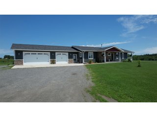 <B><font color=red>STILL ACCEPTING OFFERS</FONT></B>


Schrader Real Estate & Auction Co is pleased to present this unique real estate opportunity comprised of a beautiful custom-built home, scenic pond, large machine shed and barn, all sitting on 34+/- acres. Enjoy your morning coffee from the spacious kitchen or covered deck while seeing wildlife in the fields and pond. This setting offers both the enjoyment of relaxing by yourself or hosting large gatherings with friends and family in the finished basement or large outdoor patio with over 1,000 sq ft of outdoor finished space. Get ready to enjoy all the benefits of being in the country with both the machine shed that has a heated office or in the barn set up for your choice of any type of livestock. With the barn having concrete floor and fully insulated, this can easily be converted to a shop or storage. <br>
<li>	Built in 2021
<li>	Oversized 3-Car Garage
<li>	Custom made Cabinets and Vanities
<li>	Stainless steel appliances
<li>	Gas and Electric hookup for Stove and Dryer
<li>	Gas hookup for Living Room Fireplace
<li>	Sky lights in Master and Main bathroom
<li>	Finished Heated garage with floor drain and heavy duty wiring and receptacles 
<li>	Freestanding wood/coal Stove in living room (No electric needed)
<li>	Covered front porch, covered deck, and outdoor patio (partially covered)
<li>	Fruit/Root Cellar with Ample Shelving
<li>	Dual zone Upstairs/Downstairs energy efficient LP furnace
<li>	Whole house generator Hookup with Interlock System
<li>	R-24 sidewall/R-60 Ceiling dense pack insulation in House & Garage
<li>	Basement Spray Foamed (Walls and Box Sills)
<li>	All open windows are casement
<li>	Beautiful knotty pine ceilings on both Covered Deck and Porch
<li>	Maintenance-Free siding and decking
<li>	Cement Front porch and sidewalk to patio
<li>	Hookups for big screen in living room, Master bedroom, and Basement
<li>	120 ft drilled well 15 GPM that serves house, barn, shed, and garden
<li>	All underground wiring
<li>	Frost-free hydrant next to fertile mound garden
<li>	Small apple and pear orchard 
<li>	Landscape included trees and perennials for low maintenance 
<li>	Over 300 trees and shrubs in spacious yard 
<li>	Over 150 trees and shrubs under dripline
<li>	Approximately 0.75-acre pond 16 feet deep on far end with rock spillway
<li>	Entire driveway covered with blue rock
<li>	Frostless faucets on three sides of house
<li>	Outside receptacles on all four sides of house (eight total)
<li>	Small porch off laundry room with maintenance free decking
<li>	Battery backup sump pump that very rarely turns on
<li>	All high tensile woven wire fencing with six separated pasture and paddocks - REAL ESTATE FOR SALE 34+/- ACRES IN MARATHON COUNTY, WISCONSIN