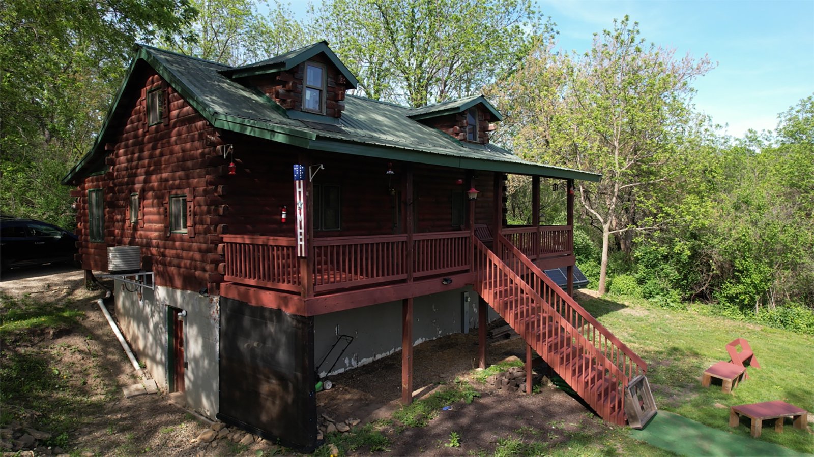 Find yourself surrounded by wooded acres sitting on the covered porch of this secluded log cabin located in central Grant County. There you can enjoy everything nature has to offer from excellent whitetail hunting to watching the variety of birds that frequent the feeders. The log cabin offers all the amenities of modern living including water, septic, electric and LP. The two centrally located food plots along with a spring-fed pond attract deer and other wildlife from the surrounding area. In the spring, enjoy chasing turkey and hunting for morel mushrooms. Take your UTV around the property or down the road just 0.2 miles away to Stitzer Bar & Grill. Perfect for any outdoor enthusiasts!<BR>
-LOG CABIN
-36+/- WOODED ACRES
-FOOD PLOTS
-EXCELLENT WHITETAIL AND TURKEY HUNTING
-POND - REAL ESTATE FOR SALE - 36+/- ACRES IN GRANT COUNTY WISCONSIN