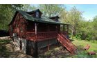 Find yourself surrounded by wooded acres sitting on the covered porch of this secluded log cabin located in central Grant County. There you can enjoy everything nature has to offer from excellent whitetail hunting to watching the variety of birds that frequent the feeders. The log cabin offers all the amenities of modern living including water, septic, electric and LP. The two centrally located food plots along with a spring-fed pond attract deer and other wildlife from the surrounding area. In the spring, enjoy chasing turkey and hunting for morel mushrooms. Take your UTV around the property or down the road just 0.2 miles away to Stitzer Bar & Grill. Perfect for any outdoor enthusiasts!<BR>
-LOG CABIN
-36+/- WOODED ACRES
-FOOD PLOTS
-EXCELLENT WHITETAIL AND TURKEY HUNTING
-POND - REAL ESTATE FOR SALE - 36+/- ACRES IN GRANT COUNTY WISCONSIN