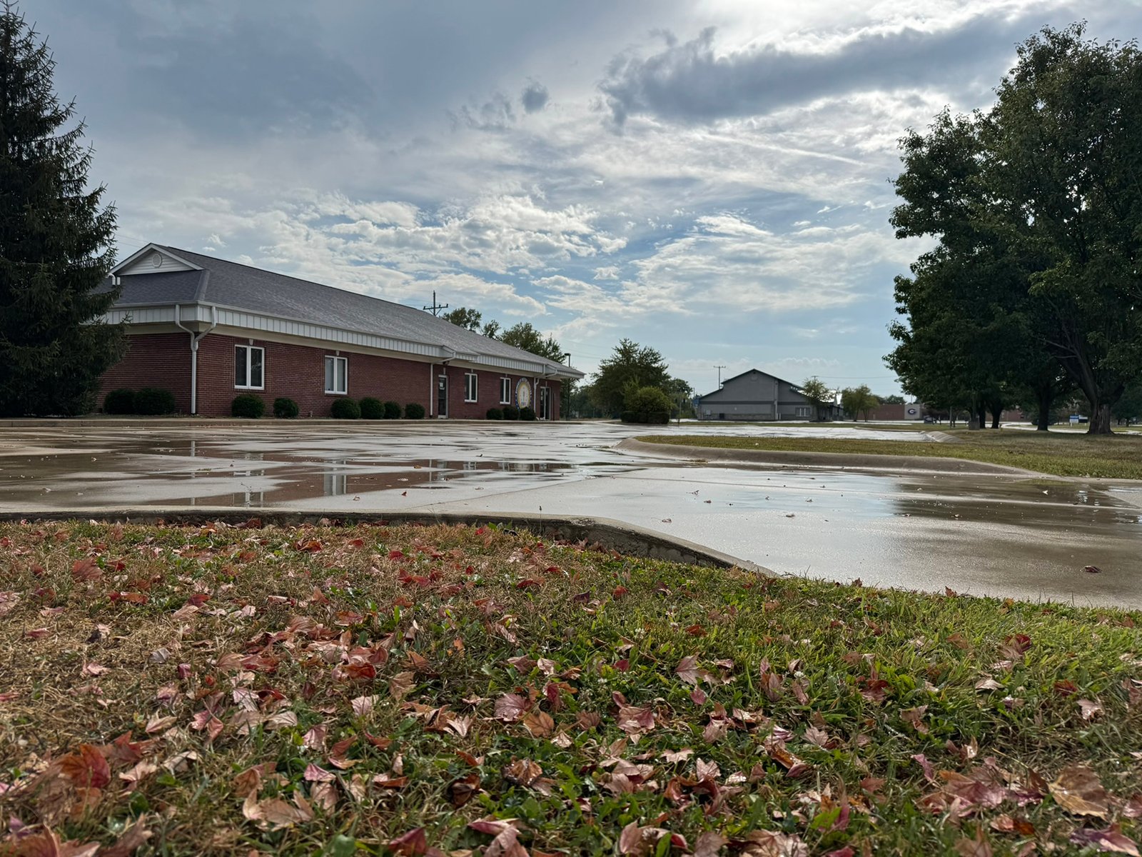 Outstanding opportunity to acquire a commercial property in Greencastle, IN with a proven long-term tenant. This site has been home to the Indiana Bureau of Motor Vehicles for more than 20 years under a favorable lease, ensuring minimal landlord responsibilities. With the current tenant there are no real estate taxes on the property.
The property spans 0.98+/- acres and includes a 4,947+/- sq ft building, built in 2004, along with a 15,180+/- sq ft parking lot providing ample customer convenience. The location is excellent - situated in Greencastle  Township, just East of Greencastle High School. With easy access from Veterans Memorial Highway (US-231) via Mill Pond Drive, the site benefits from both visibility and accessibility.
With a strong, creditworthy tenant and reliable cash flow, this property is an ideal choice for investors looking for secure, long-term income in a community-centered market. - COMMERCIAL REAL ESTATE FOR SALE - .98+/-ACRES IN PUTNAM COUNTY, INDIANA