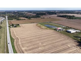 Located just 1/2 mile South of US 30 and directly across from a major industrial hub, this 35.5+/- acre parcel offers an exceptional opportunity for commercial or industrial development in a fast-growing area of Allen and Whitley Counties. With direct frontage on County Line Road and Yellow River Road, and bordered by active railroad tracks on the southern boundary, this site offers excellent logistics potential - including the possibility for a future rail spur.
Currently comprised of highly productive tillable ground with Pewamo, Blount, and Haskins soils, this tract offers strong investment value while planning for future use. The site includes dual road access, making it ideal for phased development or potential subdivision. - LAND FOR SALE IN ALLEN COUNTY, INDIANA