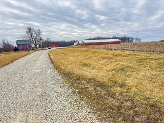 This is a tremendous opportunity to purchase a rural home and four Outbuildings with significant square footage under roof. The outbuildings offer a plethora of opportunities for livestock and/or storage, and the acreage allows for further expansion if desired. The outbuildings total 18,560 Sq. Ft. and the house contains 1,768 sq ft, 3 bedrooms, and one full bath. - REAL ESTATE FOR SALE 11.13+/- ACRES IN HUNTINGTON COUNTY, INDIANA