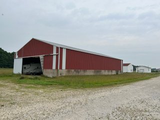 Don't miss this unique offering that includes a versatile mix of income-producing and recreational opportunities. Features include hog confinement buildings, three pole barns totaling 12,522 sq. ft. farm shop, a 1,456 sq. ft. home built in 2014, and wooded acreage. The property also includes nine lagoons-ideal for waterfowl hunting and wildlife habitat. Excellent potential for both livestock operation and hunting.<br><br>
<b>Tract 1:</b> 33.5+/-  Individual List price of $335,000. A waterfowl hunter's paradise with 7 ponds that were previous lagoons that have been cleaned and hold a heavy flow of ducks and geese. Consider the potential of stocking the ponds with fish as well. This tract also includes one confinement building that could be converted for numerous recreational uses.<br>
<b>Tract 2:</b> 16.5+/-  Individual List Price of $165,000 containing numerous outbuildings and confinement facilities. Consider the possibilities at hand with the immense amount of square footage available.<br>
<b>Tract 3:</b> 11+/-  Individual List Price of $275,000. Includes the 1,456 sq. ft. potential home and several outbuildings with wooded acreage.

 - RECREATIONAL LAND AND LIVESTOCK FACILITIES FOR SALE