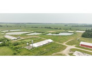 Don't miss this unique offering that includes a versatile mix of income-producing and recreational opportunities. Features include hog confinement buildings, three pole barns totaling 12,522 sq. ft. farm shop, a 1,456 sq. ft. home built in 2014, and wooded acreage. The property also includes nine lagoons-ideal for waterfowl hunting and wildlife habitat. Excellent potential for both livestock operation and hunting.<br><br>
<b>Tract 1:</b> 33.5+/-  Individual List price of $335,000. A waterfowl hunter's paradise with 7 ponds that were previous lagoons that have been cleaned and hold a heavy flow of ducks and geese. Consider the potential of stocking the ponds with fish as well. This tract also includes one confinement building that could be converted for numerous recreational uses.<br>
<b>Tract 2:</b> 16.5+/-  Individual List Price of $165,000 containing numerous outbuildings and confinement facilities. Consider the possibilities at hand with the immense amount of square footage available.<br>
<b>Tract 3:</b> 11+/-  Individual List Price of $275,000. Includes the 1,456 sq. ft. potential home and several outbuildings with wooded acreage.

 - RECREATIONAL LAND AND LIVESTOCK FACILITIES FOR SALE