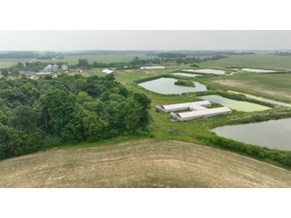 Don't miss this unique offering that includes a versatile mix of income-producing and recreational opportunities. Features include hog confinement buildings, three pole barns totaling 12,522 sq. ft. farm shop, a 1,456 sq. ft. home built in 2014, and wooded acreage. The property also includes nine lagoons-ideal for waterfowl hunting and wildlife habitat. Excellent potential for both livestock operation and hunting.<br><br>
<b>Tract 1:</b> 33.5+/-  Individual List price of $335,000. A waterfowl hunter's paradise with 7 ponds that were previous lagoons that have been cleaned and hold a heavy flow of ducks and geese. Consider the potential of stocking the ponds with fish as well. This tract also includes one confinement building that could be converted for numerous recreational uses.<br>
<b>Tract 2:</b> 16.5+/-  Individual List Price of $165,000 containing numerous outbuildings and confinement facilities. Consider the possibilities at hand with the immense amount of square footage available.<br>
<b>Tract 3:</b> 11+/-  Individual List Price of $275,000. Includes the 1,456 sq. ft. potential home and several outbuildings with wooded acreage.

 - RECREATIONAL LAND AND LIVESTOCK FACILITIES FOR SALE