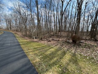 Wooded building site in Columbia City School District. A beautiful, rolling setting with a rural feel close to the amenities in Whitley County.<br><br>Subject to HOA & private road agreement.  - LAND FOR SALE 2.3+/- ACRES IN WHITLEY COUNTY, INDIANA