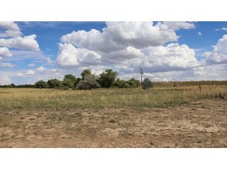 An opportunity to acquire approximately 280+/- acres along County Road 8 in southern Weld County. Strategically positioned between Fort Lupton and Brighton, the property consists of two contiguous parcels under common ownership and offers the scale and configuration to support agricultural operations, long-term investment, or future employment, industrial, technology and energy development.<BR><BR>
The property is presently zoned Agricultural in unincorporated Weld County. Its substantial acreage and location within the growing US Highway 85 and Interstate 76 corridor provide a strong foundation for a buyer prepared to evaluate zoning, infrastructure and development alternatives.<BR><BR>
Water interests include shares in the Wellington Reservoir Company, Burlington Ditch Reservoir and Land Company, and Brighton Lateral Ditch Company. Ownership, conveyance terms, historical use, transferable yield and suitability for future development remain subject to verification.<BR><BR>
The property provides access to the northern Denver metropolitan area, Denver International Airport and expanding Weld County employment centers. Existing agricultural use offers an interim holding strategy while a purchaser evaluates potential development plans and required approvals.<BR><BR>
Prospective purchasers should independently verify acreage, boundaries, access, zoning, permitted uses, utility availability and capacity, water rights, environmental conditions, mineral interests and development feasibility. No survey is being provided, and all future development concepts are subject to governmental and utility-provider approvals. - LAND FOR SALE - 280+/-ACRES IN WELD COUNTY, COLORADO