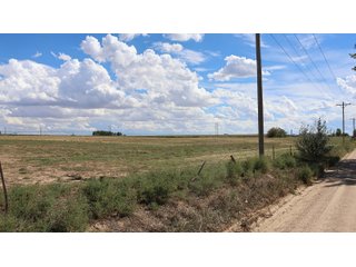 An opportunity to acquire approximately 280+/- acres along County Road 8 in southern Weld County. Strategically positioned between Fort Lupton and Brighton, the property consists of two contiguous parcels under common ownership and offers the scale and configuration to support agricultural operations, long-term investment, or future employment, industrial, technology and energy development.<BR><BR>
The property is presently zoned Agricultural in unincorporated Weld County. Its substantial acreage and location within the growing US Highway 85 and Interstate 76 corridor provide a strong foundation for a buyer prepared to evaluate zoning, infrastructure and development alternatives.<BR><BR>
Water interests include shares in the Wellington Reservoir Company, Burlington Ditch Reservoir and Land Company, and Brighton Lateral Ditch Company. Ownership, conveyance terms, historical use, transferable yield and suitability for future development remain subject to verification.<BR><BR>
The property provides access to the northern Denver metropolitan area, Denver International Airport and expanding Weld County employment centers. Existing agricultural use offers an interim holding strategy while a purchaser evaluates potential development plans and required approvals.<BR><BR>
Prospective purchasers should independently verify acreage, boundaries, access, zoning, permitted uses, utility availability and capacity, water rights, environmental conditions, mineral interests and development feasibility. No survey is being provided, and all future development concepts are subject to governmental and utility-provider approvals. - LAND FOR SALE - 280+/-ACRES IN WELD COUNTY, COLORADO