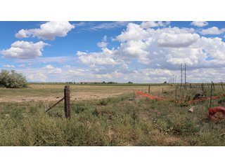 An opportunity to acquire approximately 280+/- acres along County Road 8 in southern Weld County. Strategically positioned between Fort Lupton and Brighton, the property consists of two contiguous parcels under common ownership and offers the scale and configuration to support agricultural operations, long-term investment, or future employment, industrial, technology and energy development.<BR><BR>
The property is presently zoned Agricultural in unincorporated Weld County. Its substantial acreage and location within the growing US Highway 85 and Interstate 76 corridor provide a strong foundation for a buyer prepared to evaluate zoning, infrastructure and development alternatives.<BR><BR>
Water interests include shares in the Wellington Reservoir Company, Burlington Ditch Reservoir and Land Company, and Brighton Lateral Ditch Company. Ownership, conveyance terms, historical use, transferable yield and suitability for future development remain subject to verification.<BR><BR>
The property provides access to the northern Denver metropolitan area, Denver International Airport and expanding Weld County employment centers. Existing agricultural use offers an interim holding strategy while a purchaser evaluates potential development plans and required approvals.<BR><BR>
Prospective purchasers should independently verify acreage, boundaries, access, zoning, permitted uses, utility availability and capacity, water rights, environmental conditions, mineral interests and development feasibility. No survey is being provided, and all future development concepts are subject to governmental and utility-provider approvals. - LAND FOR SALE - 280+/-ACRES IN WELD COUNTY, COLORADO
