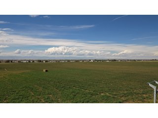 An opportunity to acquire approximately 280+/- acres along County Road 8 in southern Weld County. Strategically positioned between Fort Lupton and Brighton, the property consists of two contiguous parcels under common ownership and offers the scale and configuration to support agricultural operations, long-term investment, or future employment, industrial, technology and energy development.<BR><BR>
The property is presently zoned Agricultural in unincorporated Weld County. Its substantial acreage and location within the growing US Highway 85 and Interstate 76 corridor provide a strong foundation for a buyer prepared to evaluate zoning, infrastructure and development alternatives.<BR><BR>
Water interests include shares in the Wellington Reservoir Company, Burlington Ditch Reservoir and Land Company, and Brighton Lateral Ditch Company. Ownership, conveyance terms, historical use, transferable yield and suitability for future development remain subject to verification.<BR><BR>
The property provides access to the northern Denver metropolitan area, Denver International Airport and expanding Weld County employment centers. Existing agricultural use offers an interim holding strategy while a purchaser evaluates potential development plans and required approvals.<BR><BR>
Prospective purchasers should independently verify acreage, boundaries, access, zoning, permitted uses, utility availability and capacity, water rights, environmental conditions, mineral interests and development feasibility. No survey is being provided, and all future development concepts are subject to governmental and utility-provider approvals. - LAND FOR SALE - 280+/-ACRES IN WELD COUNTY, COLORADO