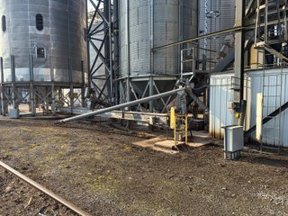 The Frick Grain and Agronomy site facilities are situated on approximately 35+/- acres and represent a rare, large-scale agribusiness operation ready for immediate use.<BR>
The grain system offers an impressive 1,660,000-bushel capacity across six bins. The tower grain dryer operates at 4,000 bu/hr at 5-point moisture removal, ensuring efficient drying capacity for high-volume harvests. The west grain facility features a grain leg capacity of 6,000 bu/hr, while the east grain facility boasts a robust 10,000 bu/hr grain leg capacity. Supporting the drying operation is an 8,000-bushel wet holding bin that feeds directly into the dryer, along with 12,000-bushel overhead load bins. The property also includes an 18,000-gallon LP tank to power operations.<br>
The agronomy infrastructure is equally impressive, featuring over 2,100,000 gallons of liquid fertilizer storage with a covered loadout facility for liquid products. A 500-ton dry fertilizer building with 8 bays provides ample space, complete with blending and loading equipment. The commercial chemical building houses 10 stainless steel tanks with over 30,000 gallons of bulk herbicide storage, equipped with a fully piped, computerized mixing system and covered loadout structure. Additional storage includes a 60' x 80' heated commercial shop building and a 50' x 90' storage building with a tote rack system for chemicals and seed.<br>
The facility enjoys direct access to the Norfolk Southern Railroad, with a large rail siding capable of receiving tanker cars and loading grain onto railcars. A dedicated piping system allows for the direct unloading of tanker cars into the two 1,000,000-gallon liquid tanks. Weighing operations are handled by a heavy-duty 120,000-pound capacity in-ground scale.<br>
As an added income stream, a telecommunications tower located on the west end of the property generates $9,268 in annual income, with an escalator clause providing year-over-year growth.<br>
Please refer to the improvement chart for dates and dimensions of all structures located on the facility.<br>
This is an extremely rare opportunity to acquire this level of grain handling and storage capacity, agronomy infrastructure, and overall square footage - all at a compelling price point. Don't miss your chance to own one of the most well-equipped agricultural facilities available on the market today! - GRAIN FACILITY FOR SALE - 35+/-ACRES IN NOBLE COUNTY, INDIANA