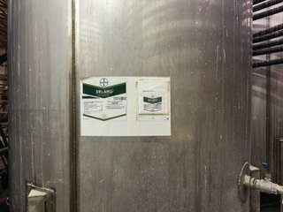 The Frick Grain and Agronomy site facilities are situated on approximately 35+/- acres and represent a rare, large-scale agribusiness operation ready for immediate use.<BR>
The grain system offers an impressive 1,660,000-bushel capacity across six bins. The tower grain dryer operates at 4,000 bu/hr at 5-point moisture removal, ensuring efficient drying capacity for high-volume harvests. The west grain facility features a grain leg capacity of 6,000 bu/hr, while the east grain facility boasts a robust 10,000 bu/hr grain leg capacity. Supporting the drying operation is an 8,000-bushel wet holding bin that feeds directly into the dryer, along with 12,000-bushel overhead load bins. The property also includes an 18,000-gallon LP tank to power operations.<br>
The agronomy infrastructure is equally impressive, featuring over 2,100,000 gallons of liquid fertilizer storage with a covered loadout facility for liquid products. A 500-ton dry fertilizer building with 8 bays provides ample space, complete with blending and loading equipment. The commercial chemical building houses 10 stainless steel tanks with over 30,000 gallons of bulk herbicide storage, equipped with a fully piped, computerized mixing system and covered loadout structure. Additional storage includes a 60' x 80' heated commercial shop building and a 50' x 90' storage building with a tote rack system for chemicals and seed.<br>
The facility enjoys direct access to the Norfolk Southern Railroad, with a large rail siding capable of receiving tanker cars and loading grain onto railcars. A dedicated piping system allows for the direct unloading of tanker cars into the two 1,000,000-gallon liquid tanks. Weighing operations are handled by a heavy-duty 120,000-pound capacity in-ground scale.<br>
As an added income stream, a telecommunications tower located on the west end of the property generates $9,268 in annual income, with an escalator clause providing year-over-year growth.<br>
Please refer to the improvement chart for dates and dimensions of all structures located on the facility.<br>
This is an extremely rare opportunity to acquire this level of grain handling and storage capacity, agronomy infrastructure, and overall square footage - all at a compelling price point. Don't miss your chance to own one of the most well-equipped agricultural facilities available on the market today! - GRAIN FACILITY FOR SALE - 35+/-ACRES IN NOBLE COUNTY, INDIANA