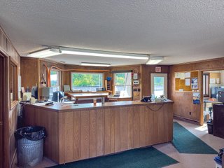 The Frick Grain and Agronomy site facilities are situated on approximately 35+/- acres and represent a rare, large-scale agribusiness operation ready for immediate use.<BR>
The grain system offers an impressive 1,660,000-bushel capacity across six bins. The tower grain dryer operates at 4,000 bu/hr at 5-point moisture removal, ensuring efficient drying capacity for high-volume harvests. The west grain facility features a grain leg capacity of 6,000 bu/hr, while the east grain facility boasts a robust 10,000 bu/hr grain leg capacity. Supporting the drying operation is an 8,000-bushel wet holding bin that feeds directly into the dryer, along with 12,000-bushel overhead load bins. The property also includes an 18,000-gallon LP tank to power operations.<br>
The agronomy infrastructure is equally impressive, featuring over 2,100,000 gallons of liquid fertilizer storage with a covered loadout facility for liquid products. A 500-ton dry fertilizer building with 8 bays provides ample space, complete with blending and loading equipment. The commercial chemical building houses 10 stainless steel tanks with over 30,000 gallons of bulk herbicide storage, equipped with a fully piped, computerized mixing system and covered loadout structure. Additional storage includes a 60' x 80' heated commercial shop building and a 50' x 90' storage building with a tote rack system for chemicals and seed.<br>
The facility enjoys direct access to the Norfolk Southern Railroad, with a large rail siding capable of receiving tanker cars and loading grain onto railcars. A dedicated piping system allows for the direct unloading of tanker cars into the two 1,000,000-gallon liquid tanks. Weighing operations are handled by a heavy-duty 120,000-pound capacity in-ground scale.<br>
As an added income stream, a telecommunications tower located on the west end of the property generates $9,268 in annual income, with an escalator clause providing year-over-year growth.<br>
Please refer to the improvement chart for dates and dimensions of all structures located on the facility.<br>
This is an extremely rare opportunity to acquire this level of grain handling and storage capacity, agronomy infrastructure, and overall square footage - all at a compelling price point. Don't miss your chance to own one of the most well-equipped agricultural facilities available on the market today! - GRAIN FACILITY FOR SALE - 35+/-ACRES IN NOBLE COUNTY, INDIANA