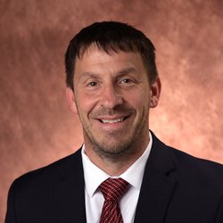 VINCE PFISTER, Schrader auction agent