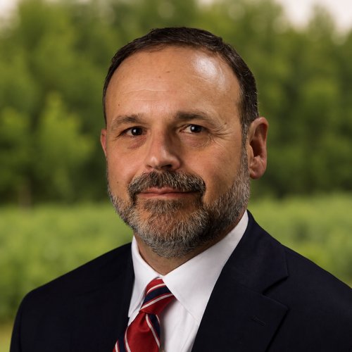 RD Schrader, Schrader auction agent