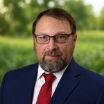 ROBERT MISHLER, Schrader auction agent