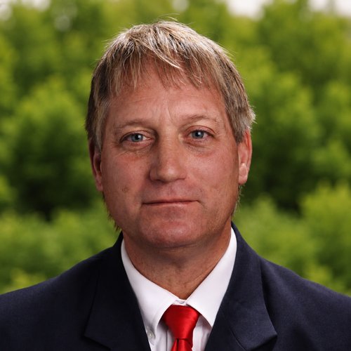 Phil Wolfe, Schrader auction agent