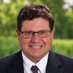 TED BOYER, Schrader auction agent